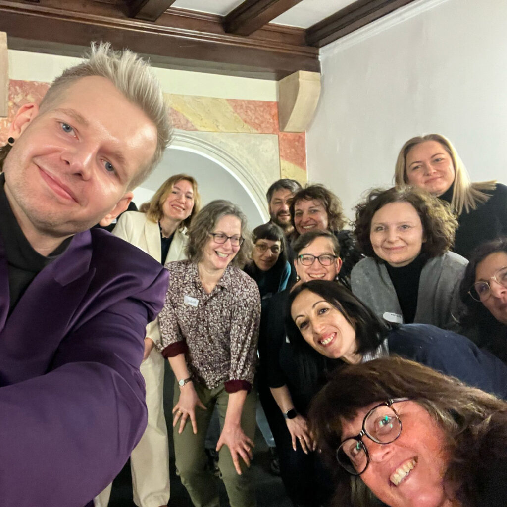 Team of people at a meeting