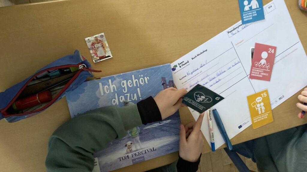 Students reading The Invisible