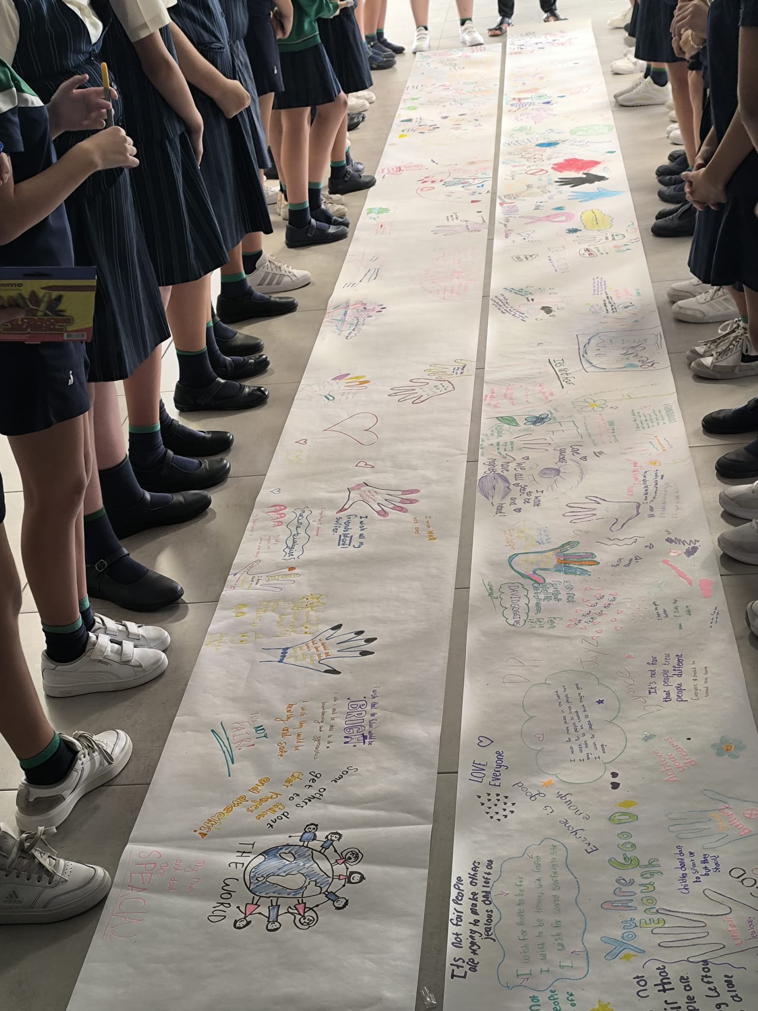 Children's thoughts laid out on giant piece of paper