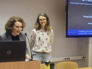 People speaking at an event