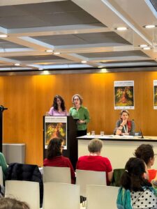 People speaking at an event