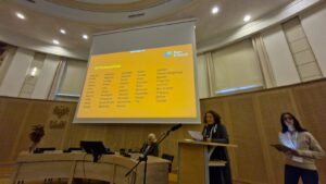 People speaking at an event