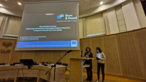 People speaking at an event