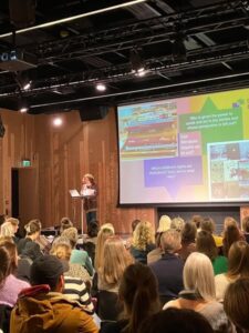 People speaking at an event